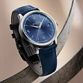 Elegant Luxury Watch With Blue Dial Blue Leather Strap And Silver Metal Case Design