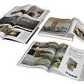 Open Interior Design Books Showcasing Modern Room Interiors And Furniture