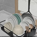 Black Kitchen Dish Rack With Plates Bowls Spoons Near Sink On Marble Countertop