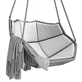 Woven Hanging Chair With Pink Cushion And Dark Blue Tassel Blanket