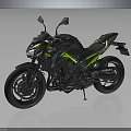 Sporty Black and Green Motorcycle with Sleek Body Design and Stylish Wheels