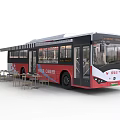 Modern Urban Red Black Bus with Large Windows and Adjacent Tables and Chairs