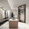 Clothing Store Interior With Clothes On Gold Racks Wooden Display Counter And Marble Floor
