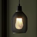 Modern Black Pendant Light With Honeycomb Mesh Design Metallic Finish And Illuminated Bulb