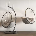 Modern Transparent Spherical Hanging Chairs With Padded Cushions And Metal Frames