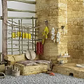 Courtyard Garden With Stone Wall Wooden Frame Hanging Bananas Garlic Chilies And Stone Bench