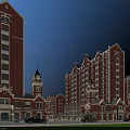 Scenic European Style Commercial Street Featuring Red Brick Buildings Towers And Cars On Road