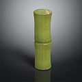 Green Cylindrical Bamboo Stem With Jointed Structure And Natural Texture On Dark Background