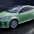 Green Sporty Two Door Car With Sleek Body Lines And Alloy Wheels