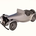 Vintage Silver Convertible Car With Classic Body Design And Open Top