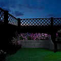 Charming Garden Landscape With White Lattice Fence Green Lawn Pink Purple Flowers Deer Shaped Decor