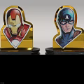 Super Hero Themed Figurines Featuring Iron Man And Captain America With Golden Bases