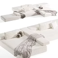 Modern Sofa Set With Soft Pillows Cozy Blanket And Neutral Tones