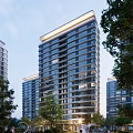 Modern High Rise Residential Building With Glass Curtain Walls Surrounded By Trees And Adjacent Buildings