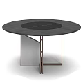 Round Dark Dining Table With Central Black Circle And Geometric Metal Legs