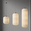 Modern White Ribbed Pendant Lights With Metal Base Hanging In Room