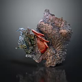 Artistic Vegetable Sculpture With Red Mushroom Green Plants And Textured Bark Surface