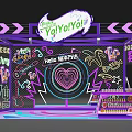 Vibrant Neon Themed Booth With YaYaYo Signage CrossFire Elements And Colorful Decorations