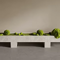 Stone Bench Decorated With Green Moss Balls Against Light Brown Wall In Minimalist Style