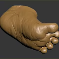 Golden Foot Sculpture With Shiny Metallic Texture On Dark Reflective Background