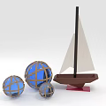 Decorative Furniture Pieces With Three Blue Spherical Decorations And Brown Sailboat Model