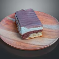 Delicious Purple Coated Layered Cake With Cream Filling On Wooden Plate