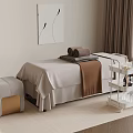 Luxury Spa Treatment Room With Massage Table Blanket Rolled Towels And Skincare Trolley