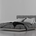 Modern Minimalist Double Bed With Gray Upholstered Headboard White Pillows And Black Throw Blanket
