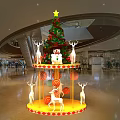 Star Top Christmas Decoration In Shopping Mall Lobby With Carousel Base And Reindeer