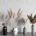 Minimalist Dried Flower Arrangements In Black White Gray Ceramic Vases With Gray Concrete Wall