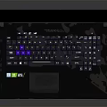ROG Laptop For Creative Design With Blue Backlit Keyboard And Colorful Illustration On Screen