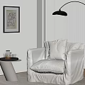 Stylish Beige Single Sofa With Cushions Side Table Tea Set And Floor Lamp