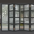 Modern Folding Glass Doors With Black Frames And Garden View For Interior Design