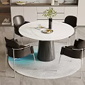 Modern Round Dining Table With Marble Top Dark Base Black Chairs Green Plants