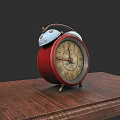 Vintage Red Alarm Clock With Bells And Roman Numerals On Wooden Table