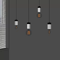 Modern Pendant Lights With Transparent Bulbs Hanging Over Gray Wall And Window Blinds