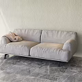 Light Gray Two Seater Sofa With Throw Pillow Against Light Colored Wall On Marble Floor 3d model