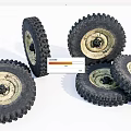 Off Road Tires With Deep Tread And Worn Rubber Stacked Together
