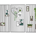 Vertical Striped Room Divider With Framed Pictures Green Plants And Heart Decor
