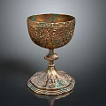 Vintage Metal Goblet With Intricate Carvings And Decorative Base For Home Use