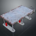 Rusty Metal Table With Gray Tabletop Rusty Edges White Pillars And Red Bases