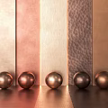 Decorative Metal Components Showcasing Five Spherical Orbs And Varied Textured Panels In Copper Brown Hues