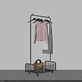 Freestanding Metal Clothes Hanger With Wheels Basket And Hanging Pink Top Gray Coat