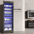 Modern Kitchen With Blue Lit Display Cabinet Dishes Glasses Built In Oven And Black Appliances
