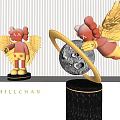 Red Winged Sculptures with Golden Wings Silver Ring and Black Marble Base