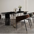 Modern Dining Table Set with Black Marble Tabletop Golden Legs White Brown Chairs and Vase