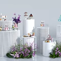 Stylish Tea Break Area With Desserts Cakes Purple Flowers And White Display Stands