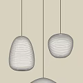 Stylish Paper Pendant Lights With Striped Design Hanging Against Light Colored Background
