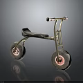 Tricycle with Golden Frame Black Seat and Gray Wheels Featuring Red Hubs on Dark Background