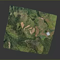 Scenic Green Hills With Farmland Plots Winding Roads And Small Water Bodies